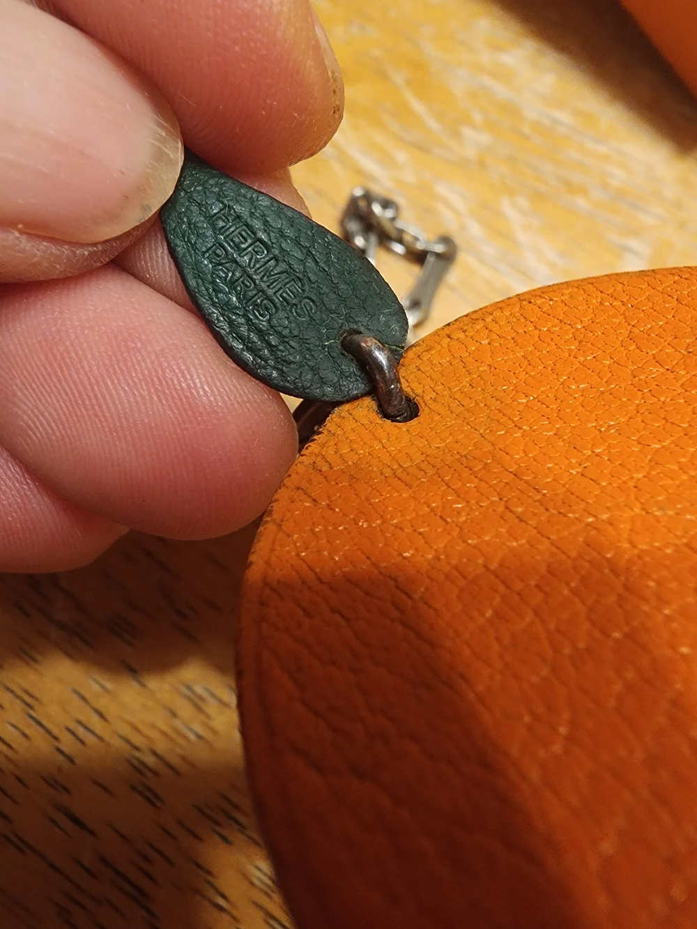 authentic Hermès orange fruit leather bag charm and keychain